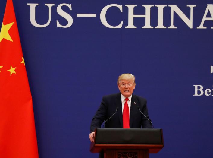 U.S. President Donald Trump delivers his speech as he and China's President Xi Jinping meet business leaders at the Great Hall of the People in Beijing, China, November 9, 2017. REUTERS/Damir Sagolj