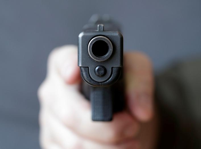 A gun owner displays a Glock 20, 10 mm Auto pistol in Vienna, Austria, March 22, 2018. REUTERS/Heinz-Peter Bader