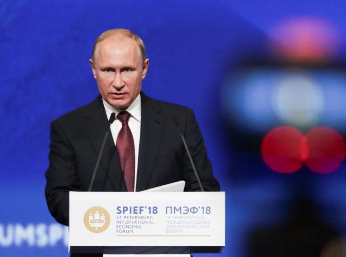 Russian President Vladimir Putin delivers a speech during a session of the St. Petersburg International Economic Forum (SPIEF), Russia May 25, 2018