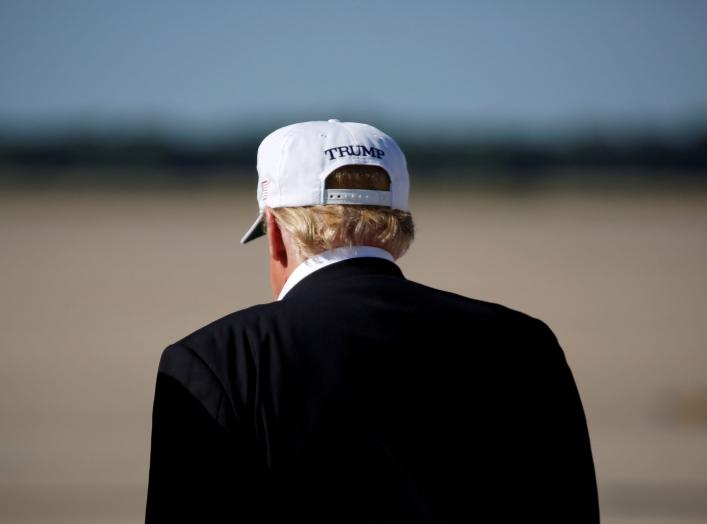 U.S. President Donald Trump walks from Air Force One as he returns from Bedminster, New Jersey, at Joint Base Andrews in Maryland, U.S., July 8, 2018. REUTERS/Joshua Roberts TPX IMAGES OF THE DAY