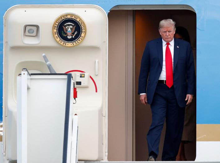 U.S. President Donald Trump and first lady Melania Trump arrive aboard Air Force One ahead of the NATO Summit, at Brussels Military Airport in Melsbroek, Belgium July 10, 2018. REUTERS/Francois Lenoir TPX IMAGES OF THE DAY