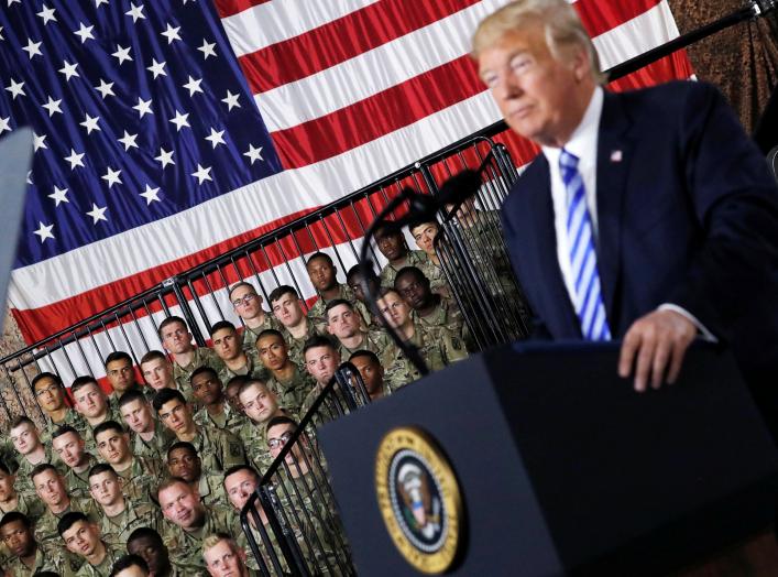 U.S. Army 10th Mountain Division troops listen as President Donald Trump speaks before signing the National Defense Authorization Act at Fort Drum, New York, U.S., August 13, 2018. REUTERS/Carlos Barria