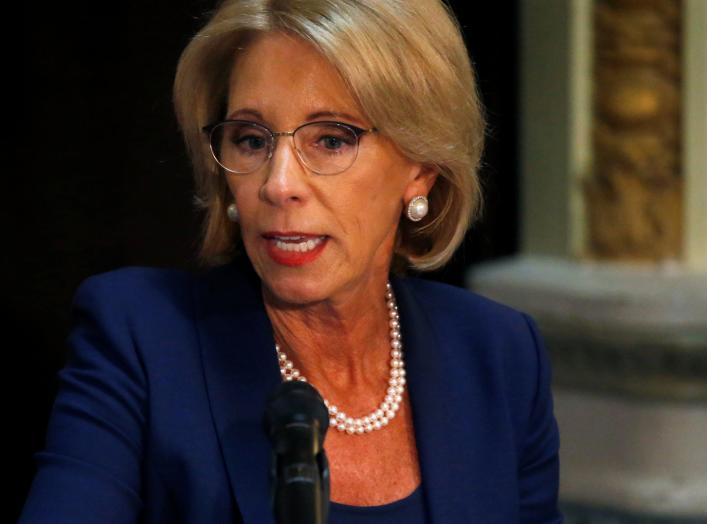 U.S. Education Secretary Betsy DeVos takes part in a Federal Commission on School Safety meeting at the White House in Washington, D.C., U.S., August 16, 2018. REUTERS/Leah Millis