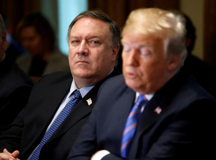 U.S. Secretary of State Mike Pompeo listens as President Donald Trump speaks during a cabinet meeting at the White House in Washington, U.S., July 18, 2018. REUTERS/Leah Millis/File Photo