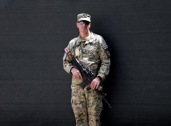 A member of NATO forces in Afghanistan, stands guard during a change of command ceremony in Resolute Support headquarters in Kabul, Afghanistan September 2, 2018. REUTERS/Mohammad Ismail