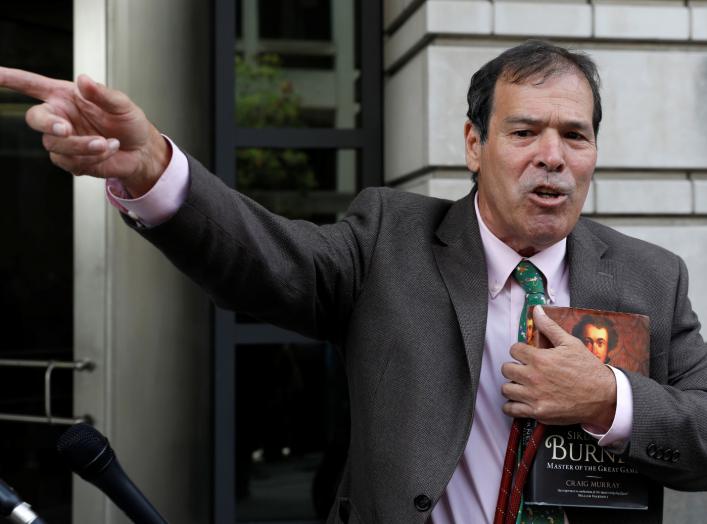 Comedian Randy Credico talks to the media outside U.S. District Court after testifying before the grand jury convened by Special Counsel Robert Mueller, in Washington, U.S., September 7, 2018. REUTERS/Yuri Gripas