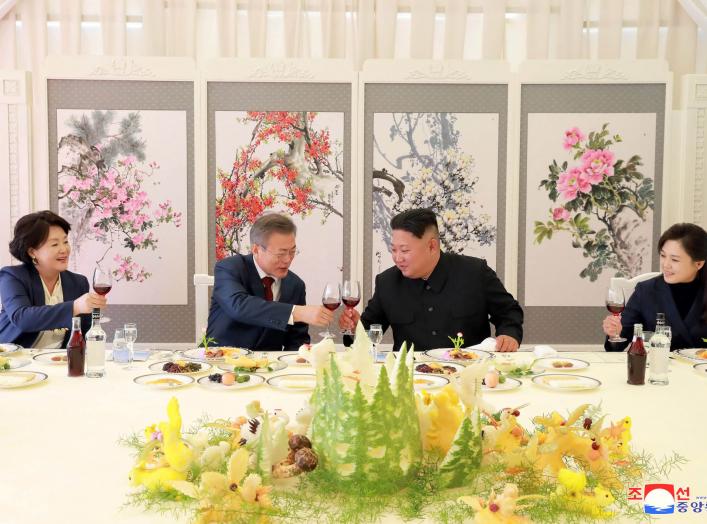 South Korea's first lady Kim Jung-sook, South Korean President Moon Jae-in, North Korean leader Kim Jong Un and his wife Ri Sol Ju toast during a luncheon, in this photo released by North Korea's Korean Central News Agency (KCNA) on September 21, 2018. KC