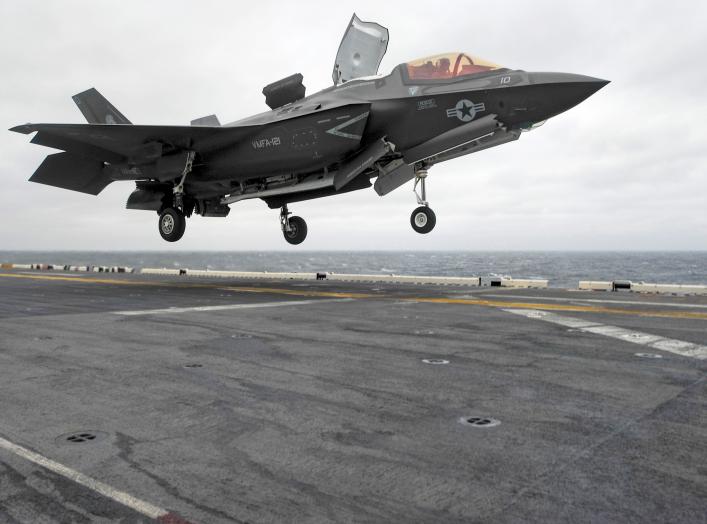 A Lockheed Martin F-35B Lightning II Joint Strike fighter jet touches down on the amphibious assault ship USS Wasp, marking the first time the aircraft has deployed aboard a U.S. Navy ship and with a Marine Expeditionary Unit in the Indo-Asian-Pacific reg