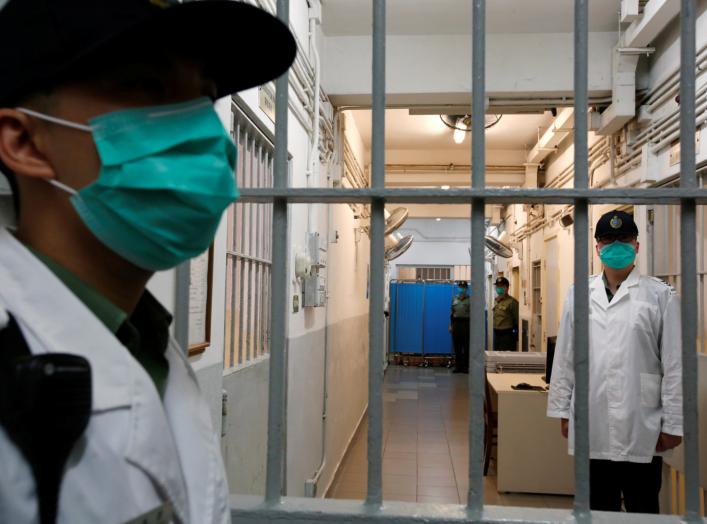 Correctional Services Department officers on patrol inside the special wards for drug tests and patients at Lai Chi Kok Reception Centre, a maximum security institution for detainees and judgement respited prisoners, in Hong Kong, China November 8, 2018.