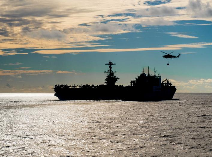 The Nimitz-class aircraft carrier USS John C. Stennis conducts a replenishment-at-sea with the dry cargo and ammunition ship USNS Charles Drew November 13, 2018. Picture taken November 13, 2018. Courtesy Nick Bauer/U.S. Navy/Handout via REUTERS ATTENTION 