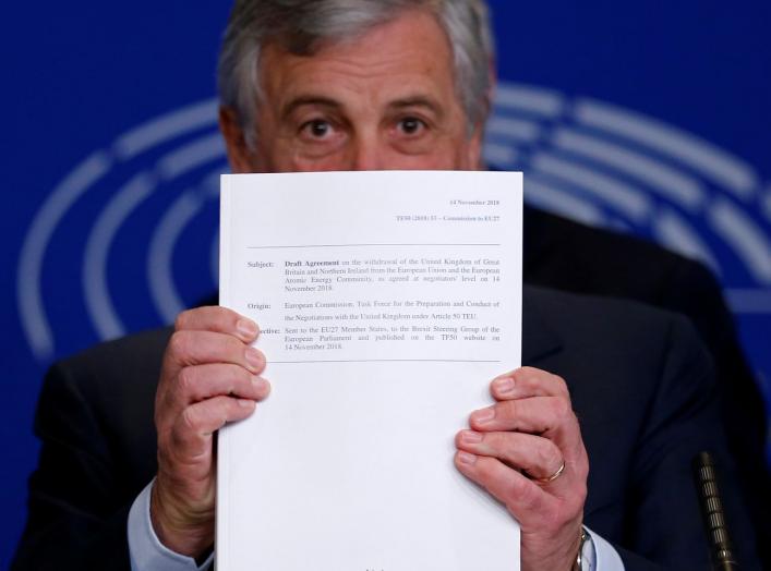 European Parliament President Antonio Tajani displays withdrawal agreement at a news conference about Brexit at the European Parliament in Strasbourg, France, November 15, 2018. REUTERS/Vincent Kessler