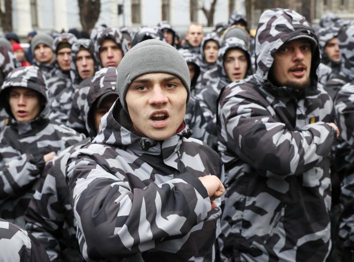 Activists of Ukraine's far-right parties attend a rally demanding to terminate diplomatic relations with Russia, near the Presidential administration headquarters in Kiev, Ukraine December 7, 2018. REUTERS/Gleb Garanich