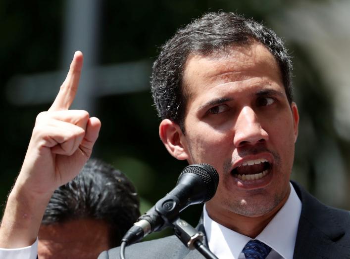 Venezuela's opposition leader Juan Guaido gestures as he speaks during a news conference in Caracas, Venezuela, January 25, 2019. REUTERS/Carlos Garcia Rawlins