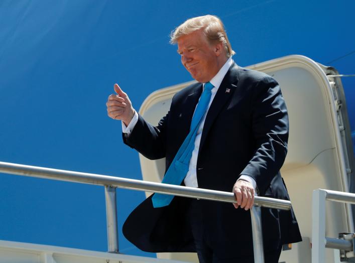 U.S. President Donald Trump gives a thumbs up as he emerges from Air Force One after arriving to attend campaign events in San Antonio, Texas, U.S., April 10, 2019. REUTERS/Carlos Barria