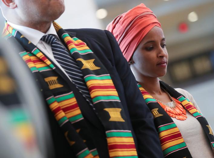 U.S. Rep. Ilhan Omar (D-MN) participates in a Congressional Black Caucus ceremony "in commemoration of the 400th anniversary of the first-recorded forced arrival of enslaved African people" to the United States in Emancipation Hall at the U.S. Capitol