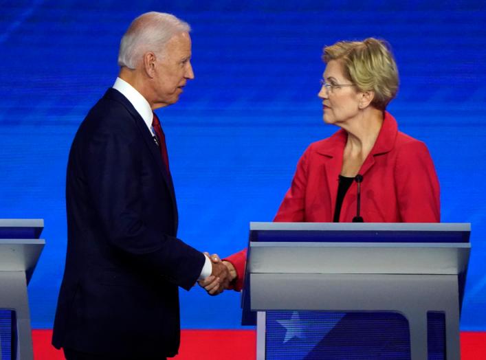 Former Vice President Joe Biden shake hands with Senator Elizabeth Warren at the conclusion of the 2020 Democratic U.S. presidential debate in Houston, Texas, U.S., September 12, 2019. REUTERS/Mike Blake