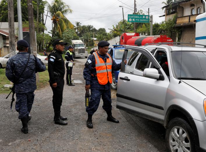 Guatemalan marines guard a checkpoint during a temporary state of siege, approved by the Guatemalan Congress in a bid to improve security following the death of several soldiers last week, in Puerto Barrios, Izabal province, Guatemala September 11, 2019. 