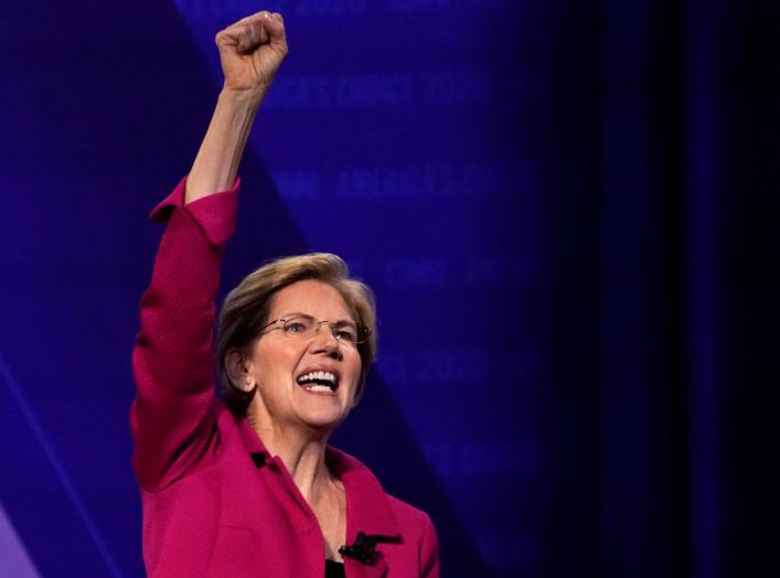 FILE PHOTO: Democratic 2020 U.S. presidential candidate Senator Elizabeth Warren (D-MA) gestures in a televised townhall on CNN dedicated to LGBTQ issues in Los Angeles, California, U.S. October 10, 2019. REUTERS/Mike Blake/File Photo