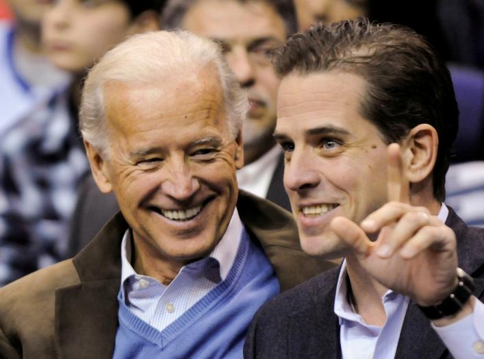 FILE PHOTO: In this file photo, former U.S. Vice President Joe Biden and his son Hunter Biden attend an NCAA basketball game between Georgetown University and Duke University in Washington, U.S., January 30, 2010. REUTERS/Jonathan Ernst/File Photo