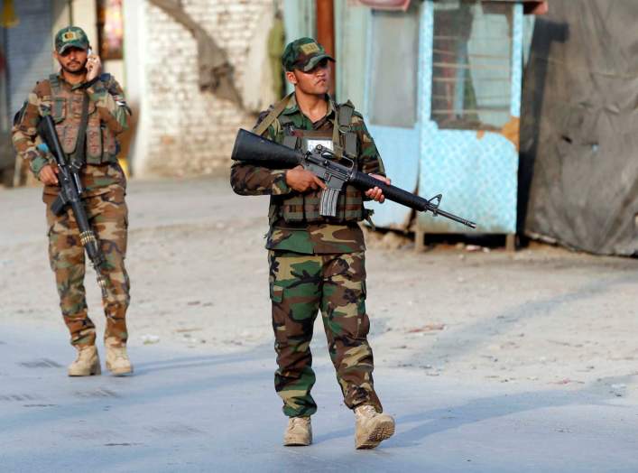 Afghan National Army (ANA) soldiers arrive at the site of a suicide car bomb blast in Jalalabad, Afghanistan October 25, 2019.REUTERS/Parwiz