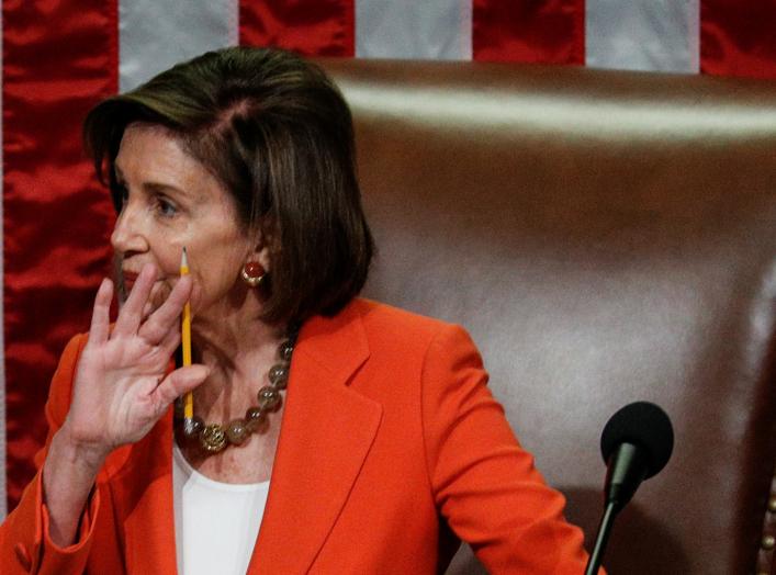 Speaker of the House Nancy Pelosi presides over the U.S. House of Representatives vote on a resolution that outlines the next steps in the impeachment inquiry of U.S. President Donald Trump on Capitol Hill in Washington, U.S.