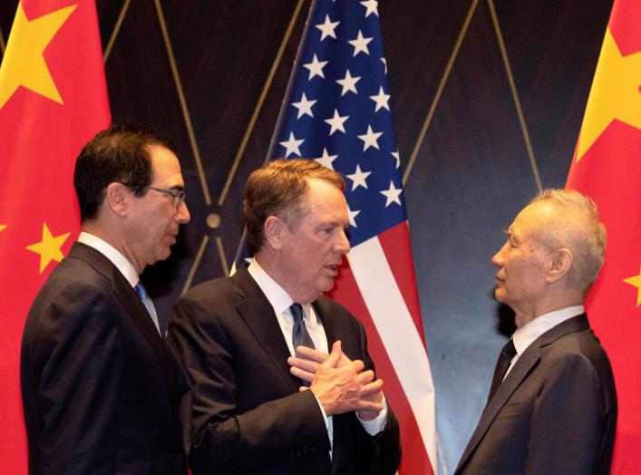 United States Trade Representative Robert Lighthizer gestures as he chats with Chinese Vice Premier Liu He with Treasury Secretary Steven Mnuchin, looking on after posing for a family photo at the Xijiao Conference Center in Shanghai, China, July 31, 2019