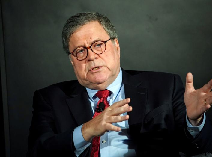 FILE PHOTO: U.S. Attorney General William Barr speaks during the Wall Street Journal CEO Council, in Washington, U.S., December 10, 2019. REUTERS/Al Drago/File Photo