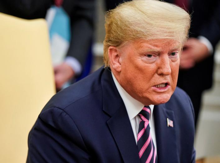 U.S. President Donald Trump speaks with Republican members of Congress a day after the House of Representatives approved articles of impeachment against the Republican president, at the White House in Washington, U.S., December 19, 2019.