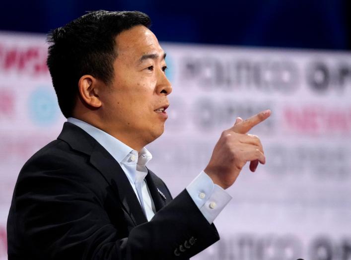 Democratic U.S. presidential candidate entrepreneur Andrew Yang speaks at the 2020 campaign debate at Loyola Marymount University in Los Angeles, California, U.S., December 19, 2019. REUTERS/Mike Blake