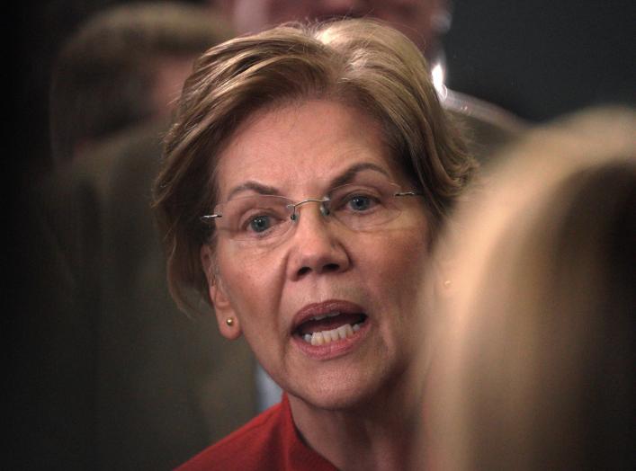 Senator Elizabeth Warren does an interview in the spin room after the sixth 2020 U.S. Democratic presidential candidates campaign debate at Loyola Marymount University in Los Angeles, California, U.S., December 19, 2019. REUTERS/Kyle Grillot