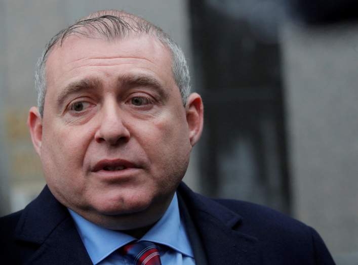 Ukrainian-American businessman Lev Parnas, an associate of President Donald Trump's personal lawyer Rudy Giuliani, exits after a bail hearing at the Manhattan Federal Court in New York, U.S., December 17, 2019. REUTERS/Brendan McDermid