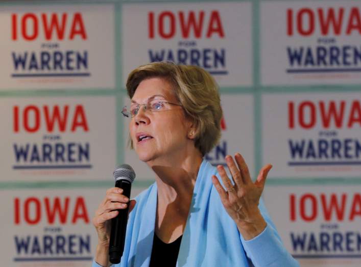 FILE PHOTO: Democratic 2020 U.S. presidential candidate and U.S. Senator Elizabeth Warren (D-MA) speaks at a campaign town hall meeting in Grimes, Iowa, U.S., January 20, 2020. REUTERS/Brian Snyder/File Photo