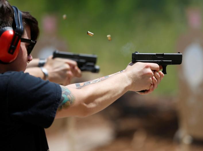 Skylar Simon shoots at targets during a firearms training class attended by members of the Pink Pistols, a national pro-gun LGBT organization, at the PMAA Gun Range in Salt Lake City, Utah, U.S., July 1, 2016. REUTERS/Jim Urquhart/File Photo