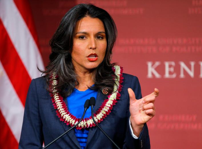 S. Representative Tulsi Gabbard (D-HI) speaks after being awarded a Frontier Award during a ceremony at the Kennedy School of Government at Harvard University in Cambridge, Massachusetts November 25, 2013. REUTERS/Brian Snyder