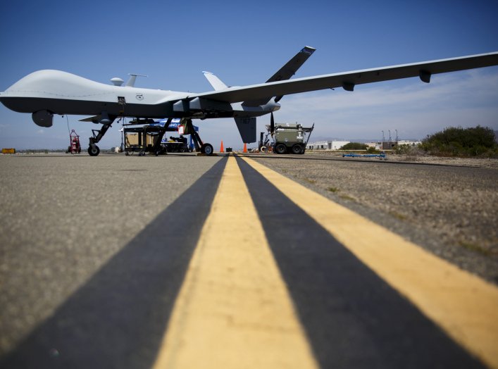 A General Atomics MQ-9 Reaper stands on the runway during "Black Dart", a live-fly, live fire demonstration of 55 unmanned aerial vehicles, or drones, at Naval Base Ventura County Sea Range, Point Mugu, near Oxnard, California July 31, 2015. REUTERS/Patri