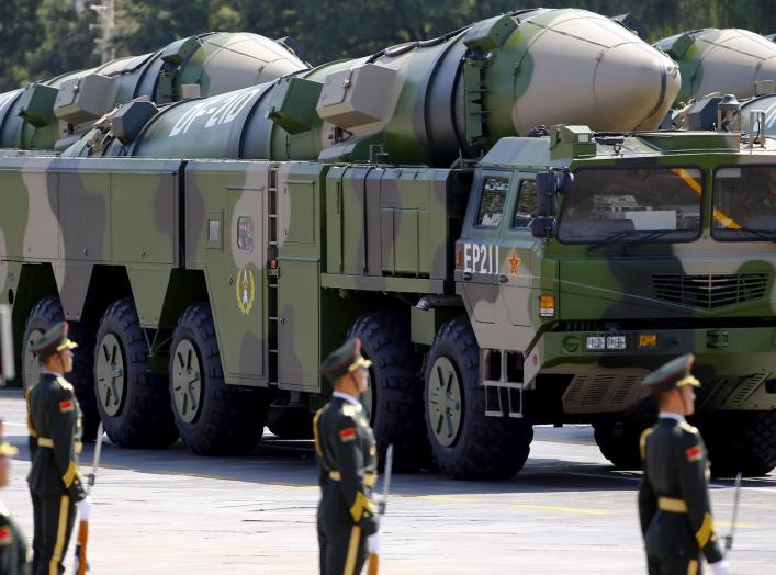 Military vehicles carrying DF-21D ballistic missiles roll to Tiananmen Square during a military parade to mark the 70th anniversary of the end of World War Two, in Beijing, China, September 3, 2015. REUTERS/Damir Sagolj