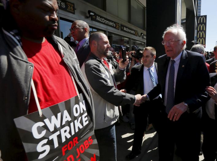 U.S. Democratic presidential candidate and U.S. Senator Bernie Sanders greets Communications Workers of America (CWA) workers striking against Verizon in Brooklyn, New York April 13, 2016. REUTERS/Brian Snyder