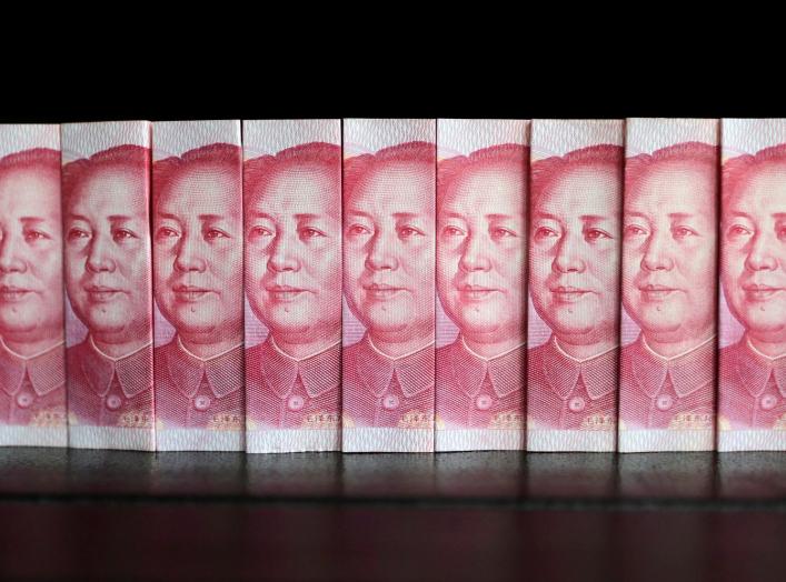 Chinese 100 yuan banknotes are seen in this picture illustration taken in Beijing July 11, 2013. REUTERS/Jason Lee/File Photo