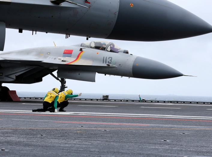 J-15 fighters from China's Liaoning aircraft carrier conduct a drill in an area of South China Sea, January 2, 2017.