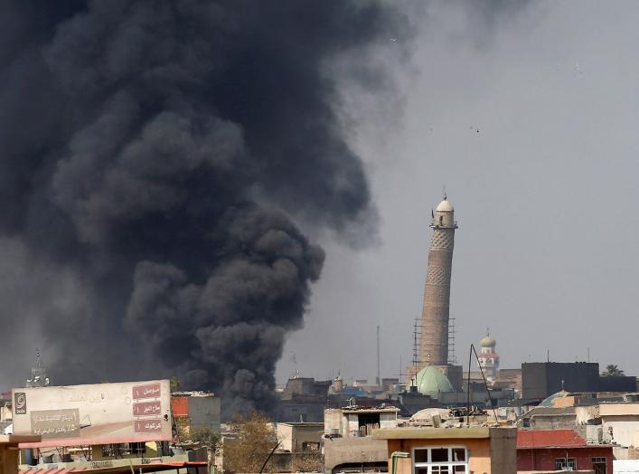 Smoke rises from clashes near Mosul's Al-Habda minaret at the Grand Mosque, where Islamic State leader Abu Bakr al-Baghdadi declared his caliphate back in 2014, as Iraqi forces battle to drive out Islamic state militants from the western part of Mosul, Ir