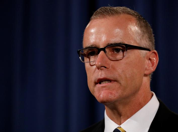 Acting FBI Director Andrew McCabe announces the results of the national health care fraud takedown during a news conference at the Justice Department in Washington, U.S., July 13, 2017. REUTERS/Aaron P. Bernstein