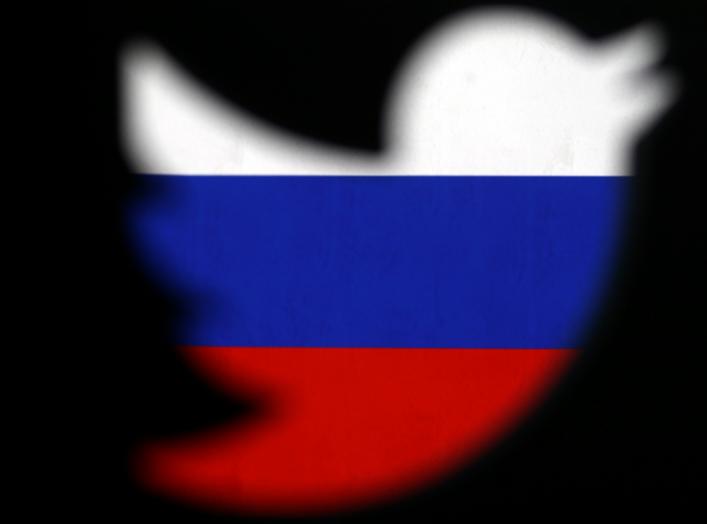 A 3D-printed Twitter logo displayed in front of Russian flag is seen in this illustration picture, October 27, 2017. REUTERS/Dado Ruvic/Illustration