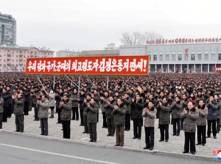 People rally to hail the completion of the state nuclear force, the cause of building a rocket power under the guidance of the Workers' Party of Korea, in this in this undated photo released by North Korea's Korean Central News Agency (KCNA) on December 6