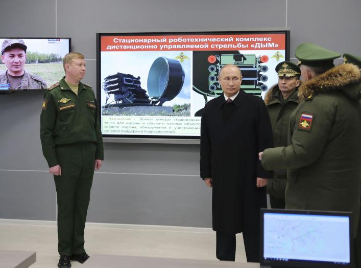 Russian President Vladimir Putin (2nd L) visits the Military Academy of the Strategic Missile Forces, named after Peter the Great, outside Moscow, Russia December 22, 2017. Sputnik/Mikhail Klimentyev/Sputnik via REUTERS ATTENTION EDITORS - THIS IMAGE WAS 