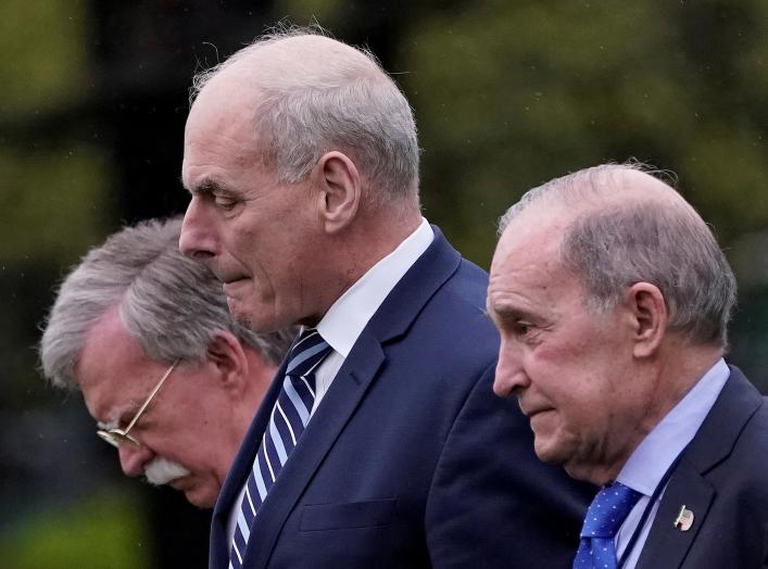 White House Chief of Staff John Kelly, White House chief economic adviser Larry Kudlow (R) and new National Security Advisor John Bolton (L) leave the Oval Office as U.S. President Donald Trump departs the White House for a trip to Miami, Florida, in Wash