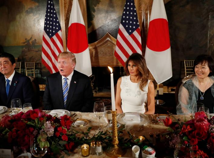 U.S. President Donald Trump (2nd from L) speaks as he sits down to dine with first lady Melania Trump, Japan's Prime Minister Shinzo Abe and his wife Akie (R) at Trump's Mar-a-Lago estate in Palm Beach, Florida, U.S., April 18, 2018. REUTERS/Kevin Lamarqu