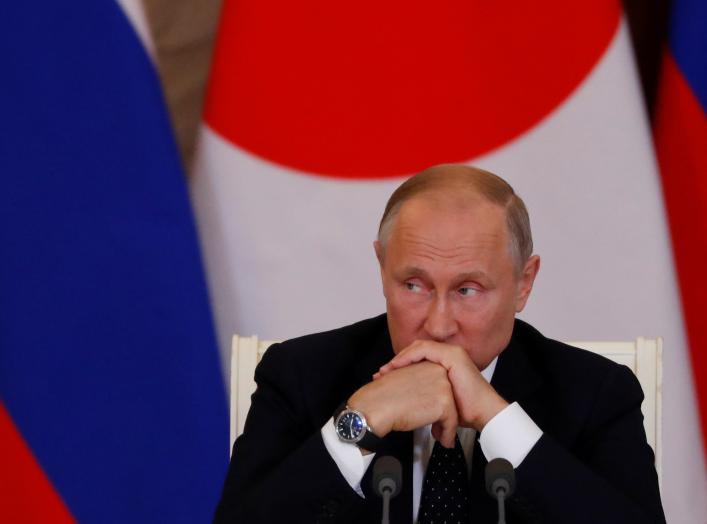 Russian President Vladimir Putin attends a joint news conference with Japanese Prime Minister Shinzo Abe following their meeting at the Kremlin in Moscow, Russia May 26, 2018