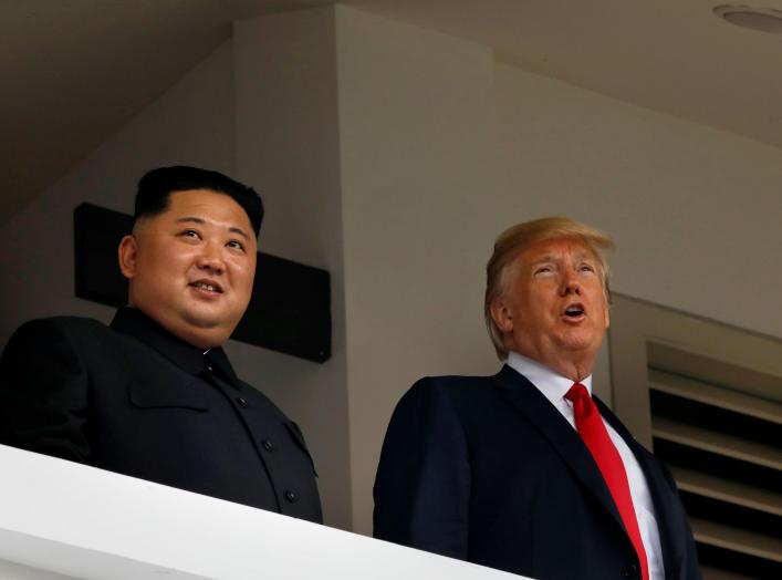 U.S. President Donald Trump and North Korea's leader Kim Jong Un hold a summit at the Capella Hotel on the resort island of Sentosa, Singapore June 12, 2018. REUTERS/Jonathan Ernst