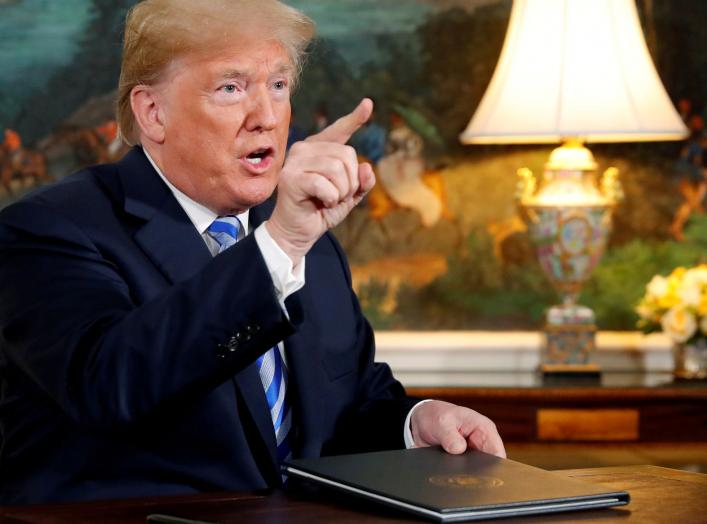 FILE PHOTO: U.S. President Donald Trump speaks to reporters after signing a proclamation declaring his intention to withdraw from the JCPOA Iran nuclear agreement in the Diplomatic Room at the White House in Washington, U.S. May 8, 2018. REUTERS/Jonathan 