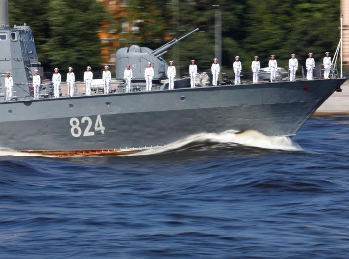 A Russian warship sails along the Neva River during the Navy Day parade in St Petersburg, Russia, July 29, 2018. REUTERS/Anton Vaganov